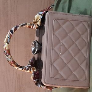 .an made being handbag